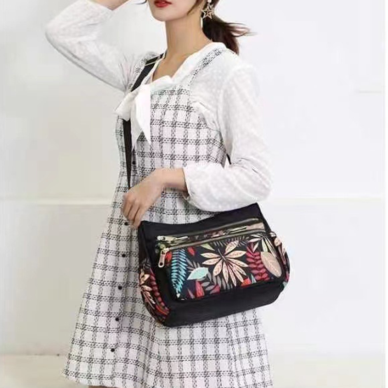 👜Divatos nyomtatott futártáska nagy kapacitással✨